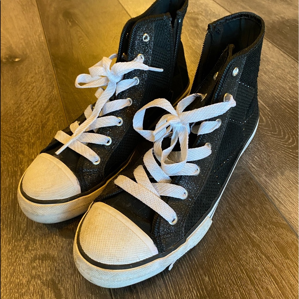 Ladies size 7 Skechers high tops shoes